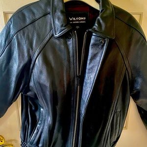 Black leather bomber jacket w/removable liner. Made by Wilson